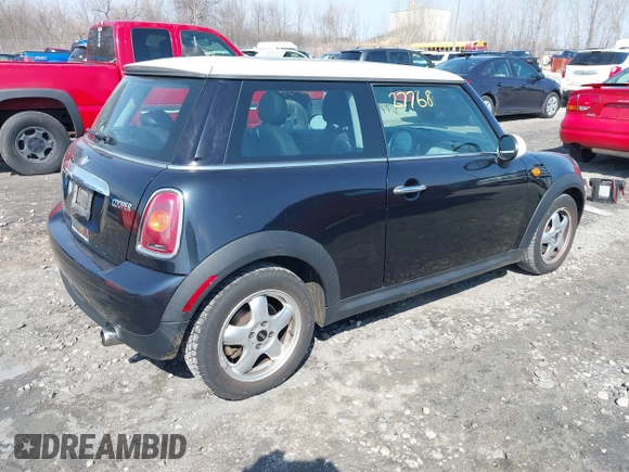 2007 MINI Hardtop with VIN WMWMF33567TT53664, listed as a IAAI auction lot 42027768 with 75,970 mi miles and . Bid and sale history available at DreamBid. Image 4.