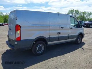2015 Ford Transit Cargo with VIN 1FTNR1ZM5FKA40014, listed as a IAAI auction lot 42258737 with 177,501 mi miles and . Bid and sale history available at DreamBid. Image 4.