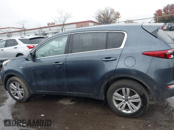 2017 Kia Sportage LX with VIN KNDPMCAC8H7217649, listed as a IAAI auction lot 40843857 with 146,881 mi miles and . Bid and sale history available at carsss.com. Image 14.