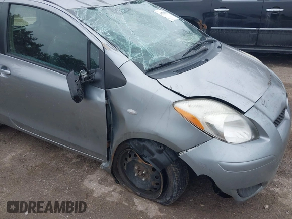 2011 Toyota Yaris with VIN JTDJT4K32B5325815, listed as a IAAI auction lot 41705028 with 137,509 mi miles. Bid and sale history available at carsss.com. Image 12.