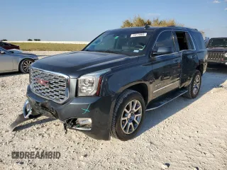 2019 GMC Yukon Denali with VIN 1GKS1CKJ9KR134571, listed as a Copart auction lot 73275664 with 50,853 mi miles and Salvage Title. Bid and sale history available at carsss.com. Image 1.