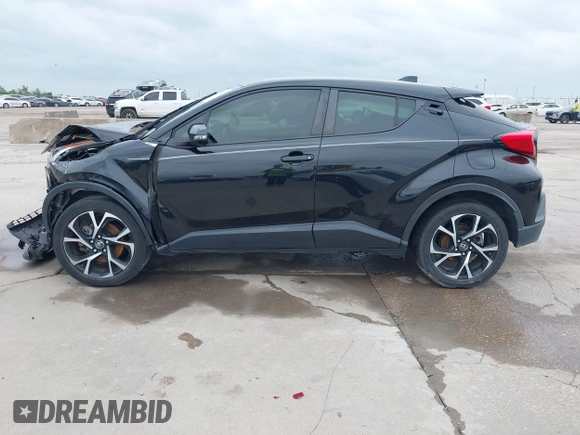 2020 Toyota C-HR LE z VIN JTNKHMBX1L1074377, wystawiony jako IAAI lot #42135672 z przebiegiem 88 846 mil mil oraz . Historia ofert i sprzedaży dostępna na DreamBid. Obrazek 14.