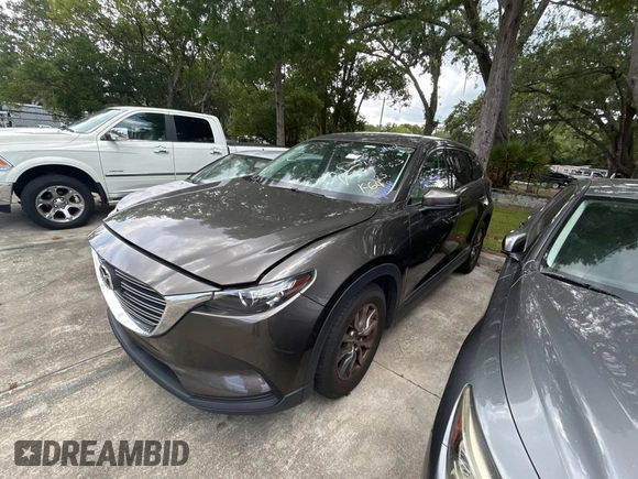 2016 Mazda CX-9 Touring с VIN JM3TCACY7G0115773, выставлен на аукционе Copart как лот 60667065 с пробегом 119 432 миль миль и Чистый • Clean title. История ставок и продаж доступна на DreamBid. Изображение 2.