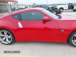 2009 Nissan 370Z Touring z VIN JN1AZ44E79M404171, wystawiony jako IAAI lot #41924058 z przebiegiem 75 940 mil mil oraz . Historia ofert i sprzedaży dostępna na DreamBid. Obrazek 13.