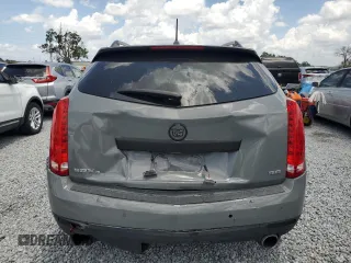 2014 Cadillac SRX Premium Collection z VIN 3GYFNGE30ES627895, wystawiony jako Copart lot #58605985 z przebiegiem 49 300 mil mil oraz Szkoda całkowita • Salvage title. Historia ofert i sprzedaży dostępna na DreamBid. Obrazek 6.