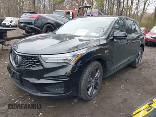 2021 Acura RDX w/A-Spec Package with VIN 5J8TC2H60ML044093, listed as a IAAI auction lot 41999368 with 29,776 mi miles and . Bid and sale history available at DreamBid. Image 2.