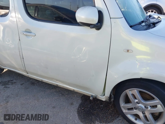 2009 Nissan Cube SL z VIN JN8AZ28R19T106532, wystawiony jako IAAI lot #40675288 z przebiegiem Nie podano mil oraz . Historia ofert i sprzedaży dostępna na DreamBid. Obrazek 15.