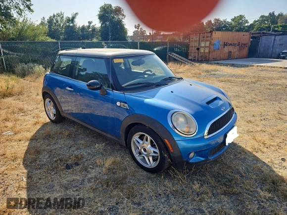 2009 MINI Hardtop S with VIN WMWMF73519TW86705, listed as a Copart auction lot 59819515 with 80,443 mi miles and Clean title. Bid and sale history available at DreamBid. Image 1.