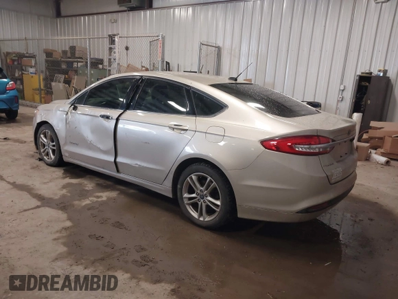 2018 Ford Fusion S z VIN 3FA6P0UU5JR100377, wystawiony jako IAAI lot #41300284 z przebiegiem 108 936 mil mil oraz . Historia ofert i sprzedaży dostępna na DreamBid. Obrazek 3.