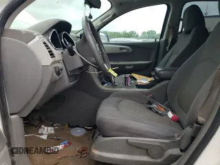2012 Chevrolet Traverse LS z VIN 1GNKRFEDXCJ143055, wystawiony jako Copart lot #56139025 z przebiegiem 243 496 mil mil oraz Szkoda całkowita • Salvage title. Historia ofert i sprzedaży dostępna na DreamBid. Obrazek 7.