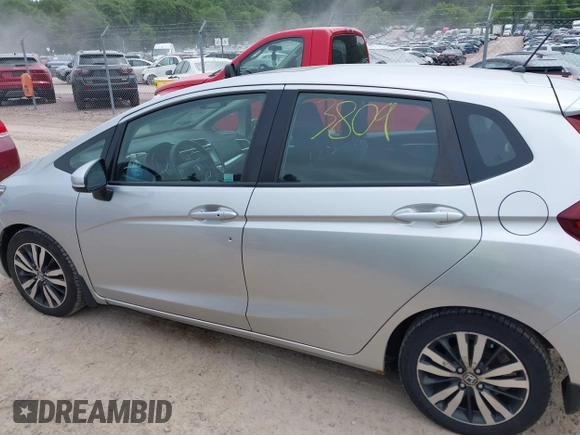 2015 Honda Fit EX-L z VIN 3HGGK5H8XFM730425, wystawiony jako IAAI lot #42503809 z przebiegiem 105 469 mil mil oraz . Historia ofert i sprzedaży dostępna na DreamBid. Obrazek 14.