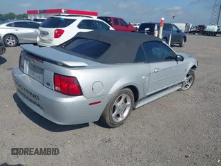 2002 Ford Mustang Deluxe with VIN 1FAFP44432F205991, listed as a IAAI auction lot 42144709 with 138,119 mi miles and . Bid and sale history available at DreamBid. Image 4.