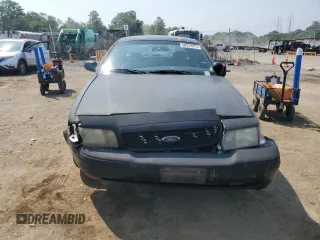 2007 Ford Police Interceptor z VIN 2FAFP71WX7X156954, wystawiony jako Copart lot #60929015 z przebiegiem 174 531 mil mil oraz Szkoda całkowita • Salvage title. Historia ofert i sprzedaży dostępna na DreamBid. Obrazek 5.