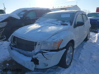 2011 Dodge Caliber Rush with VIN 1B3CB8HB4BD254464, listed as a IAAI auction lot 41273534 with 66,455 mi miles. Bid and sale history available at carsss.com. Image 17.