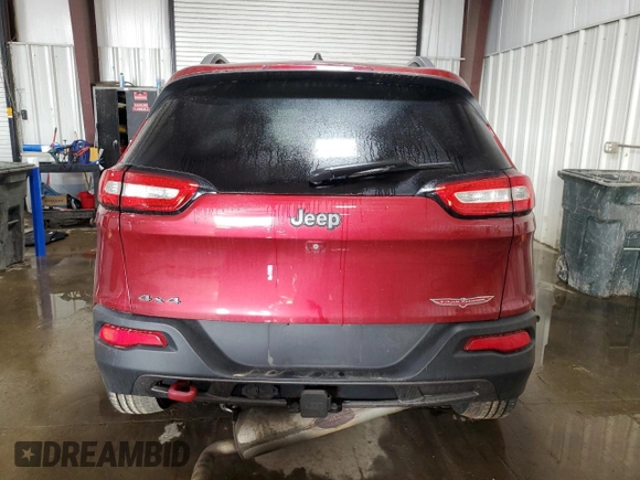 2015 Jeep Cherokee Trailhawk with VIN 1C4PJMBB8FW576765, listed as a Copart auction lot 49097925 with 299,877 mi miles and Clean Title. Bid and sale history available at DreamBid. Image 6.