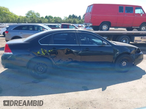 2013 Chevrolet Impala Police z VIN 2G1WD5E31D1256682, wystawiony jako IAAI lot #42276990 z przebiegiem 148 251 mil mil oraz . Historia ofert i sprzedaży dostępna na DreamBid. Obrazek 14.