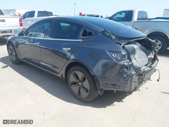 2018 Tesla Model 3 Long Range Battery with VIN 5YJ3E1EA4JF157782, listed as a IAAI auction lot 41774169 with 123,239 mi miles. Bid and sale history available at carsss.com. Image 3.