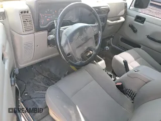 2003 Jeep Wrangler Sahara with VIN 1J4FA59S73P312279, listed as a Copart auction lot 60230445 with 151,886 mi miles and Clean title. Bid and sale history available at DreamBid. Image 8.