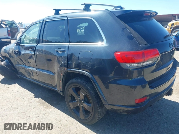 2014 Jeep Grand Cherokee Laredo with VIN 1C4RJEAG0EC580675, listed as a IAAI auction lot 41773879 with 127,714 mi miles. Bid and sale history available at carsss.com. Image 3.