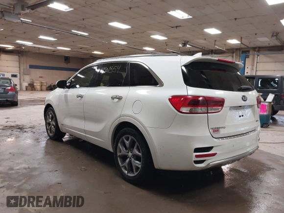 2016 Kia Sorento SX with VIN 5XYPKDA51GG077698, listed as a IAAI auction lot 41501354 with 185,494 mi miles. Bid and sale history available at carsss.com. Image 3.