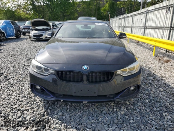2016 BMW 4 Series 428i xDrive with VIN WBA3N9C54GK250508, listed as a Copart auction lot 58236065 with 98,505 mi miles and Salvage title. Bid and sale history available at DreamBid. Image 5.