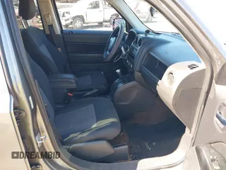 2013 Jeep Patriot Latitude with VIN 1C4NJPFB7DD254744, listed as a IAAI auction lot 40540820 with 129,465 mi miles and . Bid and sale history available at carsss.com. Image 5.