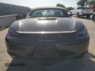 2019 Porsche 718 Boxster z VIN WP0CA2A81KS210463, wystawiony jako Copart lot #57274135 z przebiegiem 13 852 mil mil oraz Tytuł czysty. Historia ofert i sprzedaży dostępna na DreamBid. Obrazek 6.