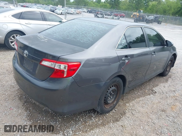2014 Toyota Camry L with VIN 4T1BF1FK1EU771679, listed as a IAAI auction lot 42090764 with 216,362 mi miles and . Bid and sale history available at DreamBid. Image 4.
