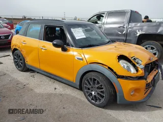 2016 MINI Hardtop 4 Door z VIN WMWXU1C56G2D10006, wystawiony jako IAAI lot #41752731 z przebiegiem 67 844 mil mil oraz . Historia ofert i sprzedaży dostępna na DreamBid. Obrazek 1.