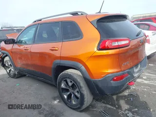 2015 Jeep Cherokee Trailhawk with VIN 1C4PJMBB3FW642266, listed as a IAAI auction lot 41510571 with 72,030 mi miles and . Bid and sale history available at DreamBid. Image 14.