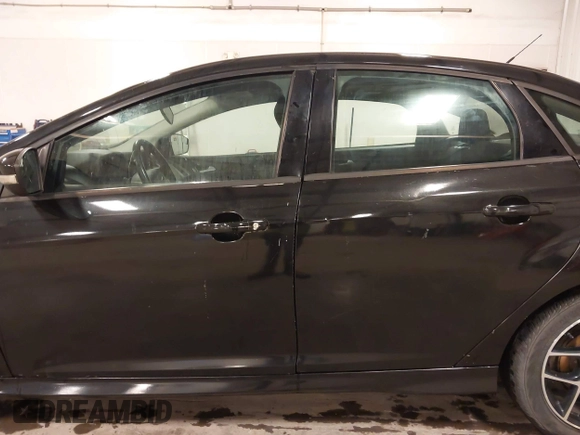 2015 Ford Focus SE with VIN 1FADP3F24FL255450, listed as a IAAI auction lot 41673301 with 103,650 mi miles. Bid and sale history available at carsss.com. Image 17.