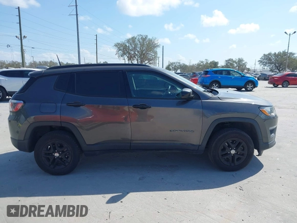 2017 Jeep Compass Sport z VIN 3C4NJDAB7HT658035, wystawiony jako IAAI lot #41545683 z przebiegiem 78 899 mil mil oraz . Historia ofert i sprzedaży dostępna na DreamBid. Obrazek 13.
