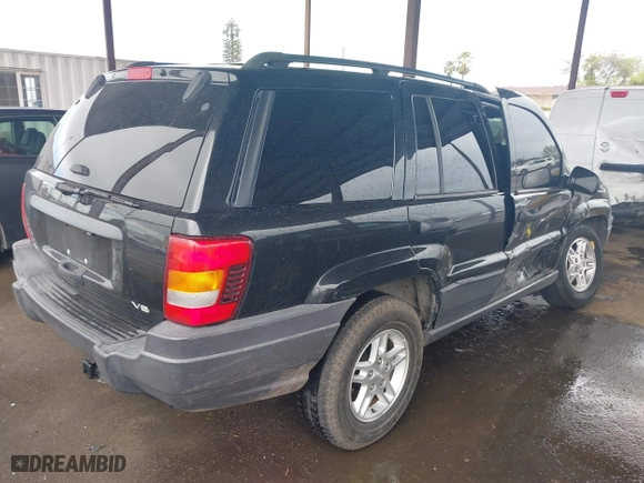 2004 Jeep Grand Cherokee Laredo with VIN 1J4GX48N94C435700, listed as a IAAI auction lot 41809624 with 147,413 mi miles. Bid and sale history available at carsss.com. Image 4.