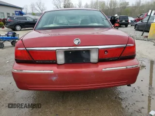 2000 Mercury Grand Marquis LS z VIN 2MEFM75WXYX726819, wystawiony jako Copart lot #52873675 z przebiegiem 144 692 mil mil oraz Nie do naprawy. Historia ofert i sprzedaży dostępna na DreamBid. Obrazek 6.