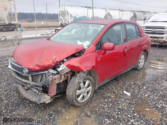 2010 Nissan Versa 1.8 S with VIN 3N1BC1APXAL420888, listed as a IAAI auction lot 41239495 with 224,860 mi miles. Bid and sale history available at carsss.com. Image 2.