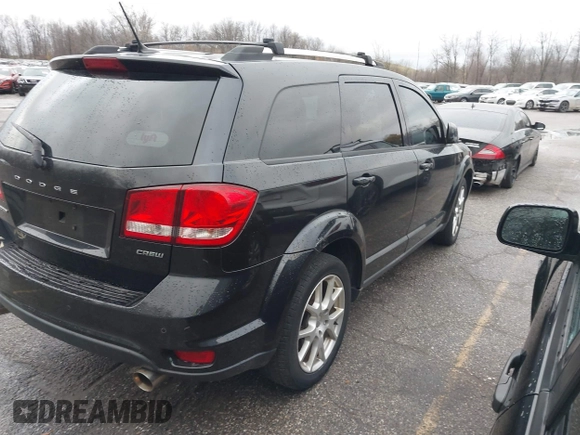 2013 Dodge Journey Crew с VIN 3C4PDCCG1DT640935, выставлен на аукционе IAAI как лот 40676564 с пробегом 154 885 миль миль и . История ставок и продаж доступна на DreamBid. Изображение 4.