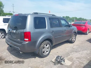 2009 Honda Pilot EX-L with VIN 5FNYF48569B050795, listed as a IAAI auction lot 42149732 with 281,504 mi miles. Bid and sale history available at carsss.com. Image 4.