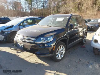 2017 Volkswagen Tiguan Wolfsburg Edition with VIN WVGSV7AX4HW511407, listed as a IAAI auction lot 41283078 with 73,318 mi miles. Bid and sale history available at carsss.com. Image 17.