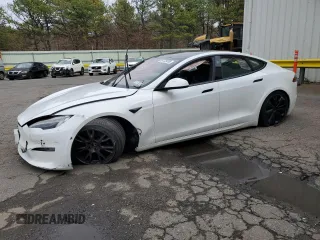 2021 Tesla Model S Long Range z VIN 5YJSA1E54MF439287, wystawiony jako Copart lot #51729285 z przebiegiem Nie podano mil oraz Szkoda całkowita • Salvage title. Historia ofert i sprzedaży dostępna na DreamBid. Obrazek 1.