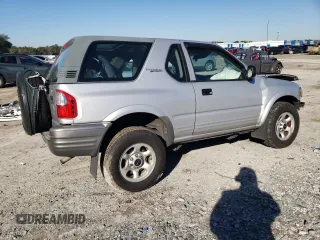2002 Isuzu Rodeo z VIN 4S2CK57W524323426, wystawiony jako Copart lot #42191765 z przebiegiem 112 024 mil mil oraz Szkoda całkowita • Salvage title. Historia ofert i sprzedaży dostępna na DreamBid. Obrazek 3.