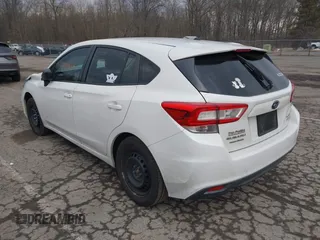 2017 Subaru Impreza with VIN 4S3GTAA68H3751534, listed as a IAAI auction lot 41719864 with 100,417 mi miles. Bid and sale history available at carsss.com. Image 3.