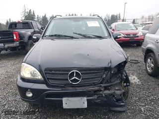 2002 Mercedes-Benz M-Class with VIN 4JGAB54E72A296354, listed as a IAAI auction lot 41277897 with 101,842 mi miles. Bid and sale history available at carsss.com. Image 12.