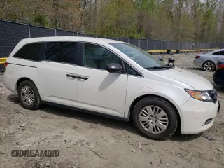 2014 Honda Odyssey LX with VIN 5FNRL5H27EB116435, listed as a Copart auction lot 52864825 with 94,643 mi miles and Salvage Title. Bid and sale history available at DreamBid. Image 4.