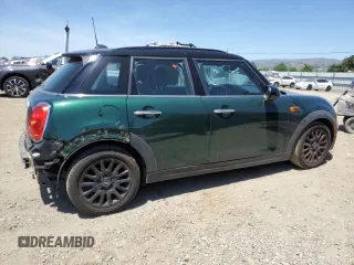 2015 MINI Hardtop 4 Door with VIN WMWXS5C56FT830564, listed as a Copart auction lot 55784695 with 52,089 mi miles and Salvage Title. Bid and sale history available at DreamBid. Image 3.