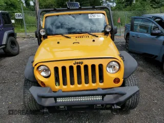 2012 Jeep Wrangler Sport with VIN 1C4AJWAG6CL247929, listed as a Copart auction lot 58942515 with 113,833 mi miles and Salvage title. Bid and sale history available at DreamBid. Image 5.