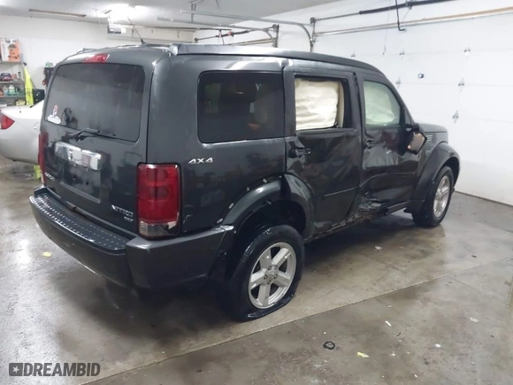 2010 Dodge Nitro SXT with VIN 1D4PU5GK0AW126478, listed as a IAAI auction lot 41362674 with 171,704 mi miles. Bid and sale history available at carsss.com. Image 4.