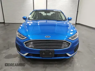2020 Ford Fusion Hybrid SEL with VIN 3FA6P0MU2LR203792, listed as a Copart auction lot 48302105 with 83,383 mi miles and Clean Title. Bid and sale history available at carsss.com. Image 5.