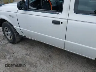 2005 Ford Ranger XL z VIN 1FTYR14U45PB04775, wystawiony jako IAAI lot #42431276 z przebiegiem 131 116 mil mil oraz . Historia ofert i sprzedaży dostępna na DreamBid. Obrazek 6.