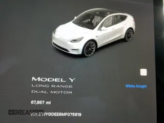 2021 Tesla Model Y Long Range with VIN 5YJYGDEE6MF075819, listed as a Copart auction lot 50903425 with 67,857 mi miles and Salvage Title. Bid and sale history available at DreamBid. Image 9.