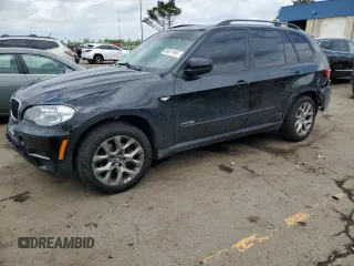 2012 BMW X5 35i z VIN 5UXZV4C59CL758816, wystawiony jako Copart lot #58651965 z przebiegiem 147 365 mil mil oraz Czysty tytuł • Clean title. Historia ofert i sprzedaży dostępna na DreamBid. Obrazek 1.
